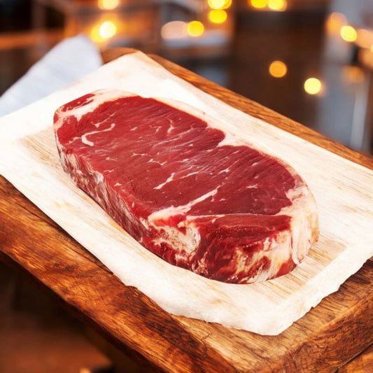 Corte New York de res Angus premium de Cortes Celorio, carne gourmet mexicana con marmoleo equilibrado.