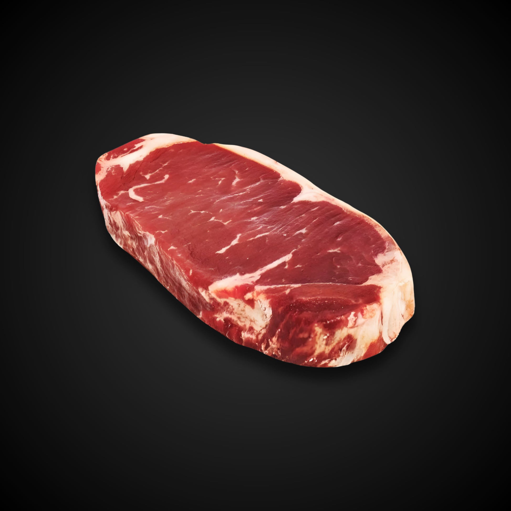 Corte New York de res Angus premium de Cortes Celorio, con marmoleo intenso y textura jugosa.