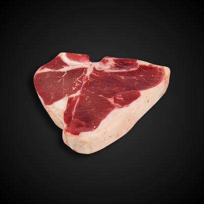 Corte Porterhouse de res Angus premium, seleccionado artesanalmente por Cortes Celorio, ideal para chefs y parrilleros.
